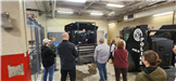 Citizen Academy tours the Police Department's garage. 