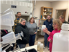 Citizen Academy attendees learn about the biology of a lab at the wastewater treatment plant. 
