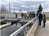 2024 Citizen Academy looks at wastewater treatment pond. 