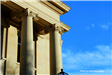 State Library building exterior in front of a blue sky. 