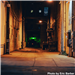 An alley at night. 