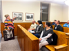 Citizen Academy attendees listen to a presentation in the municipal court. 