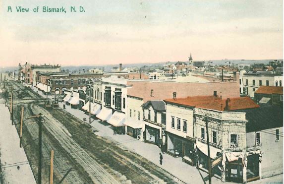 Postcard artwork of Bismarck Main Avenue when Main Avenue was a dirt road. 