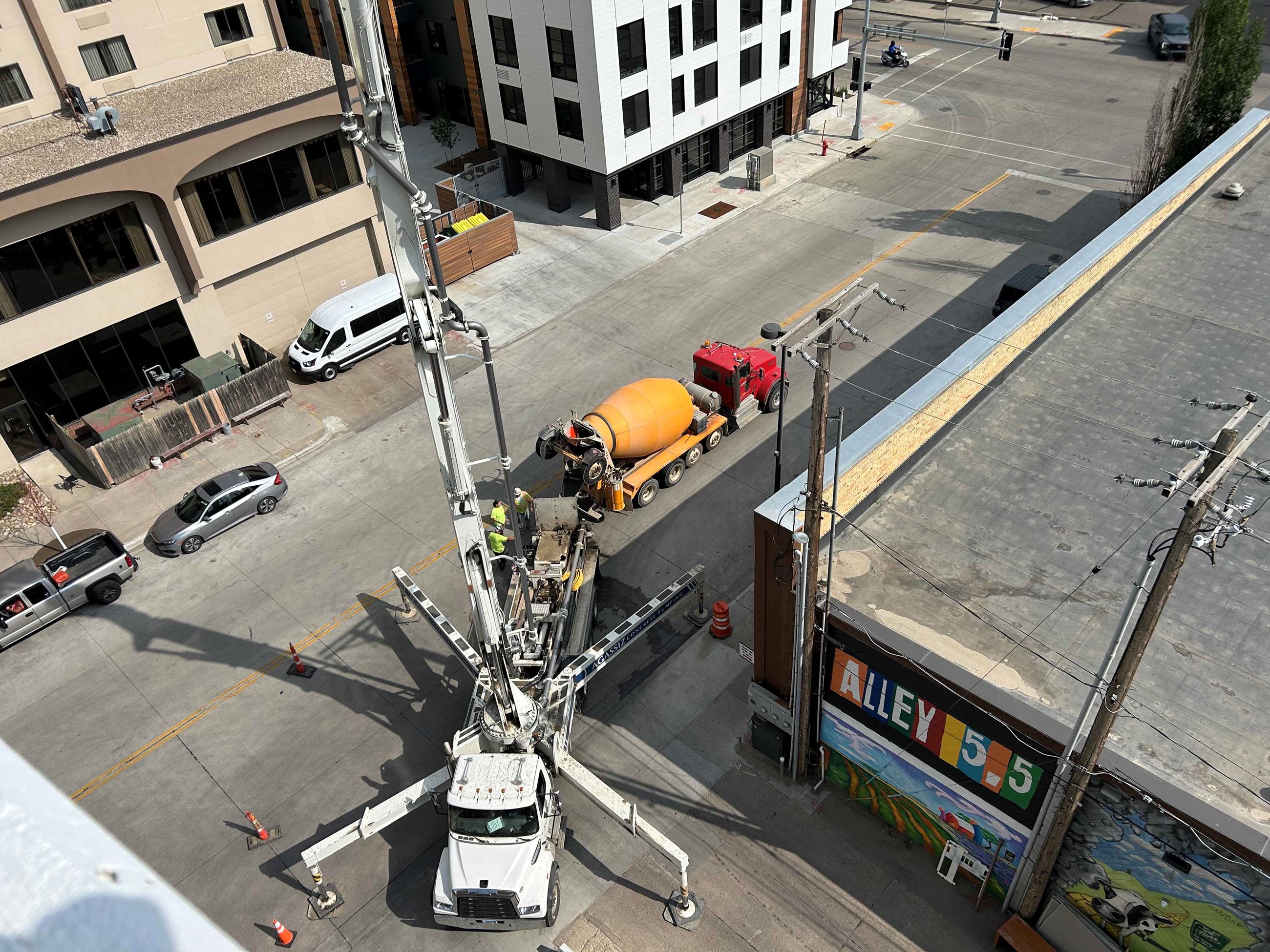 A pump is used to lift concrete from street level to the top of the Parkade. 