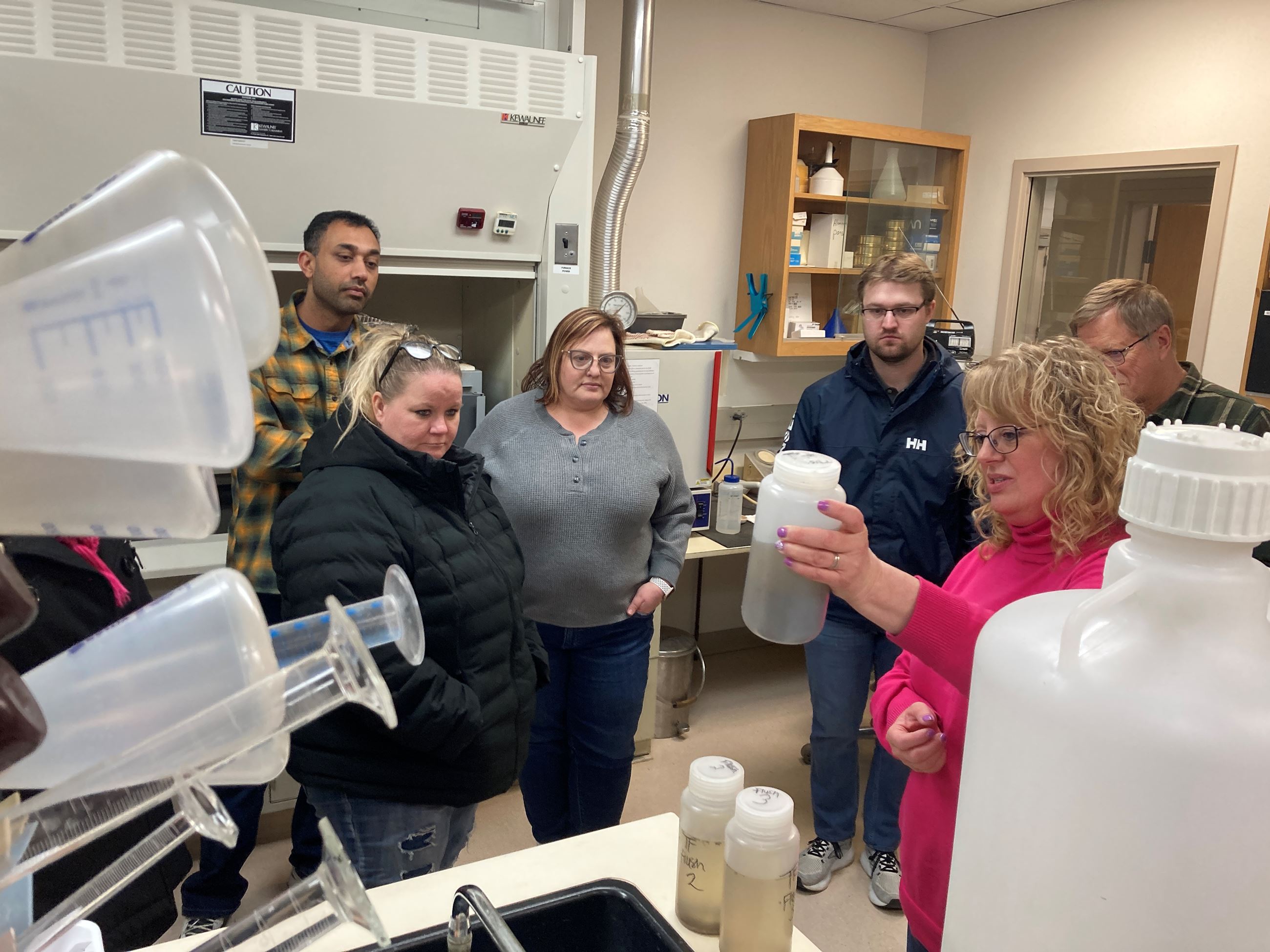 Citizen Academy attendees learn about the biology of a lab at the wastewater treatment plant. 
