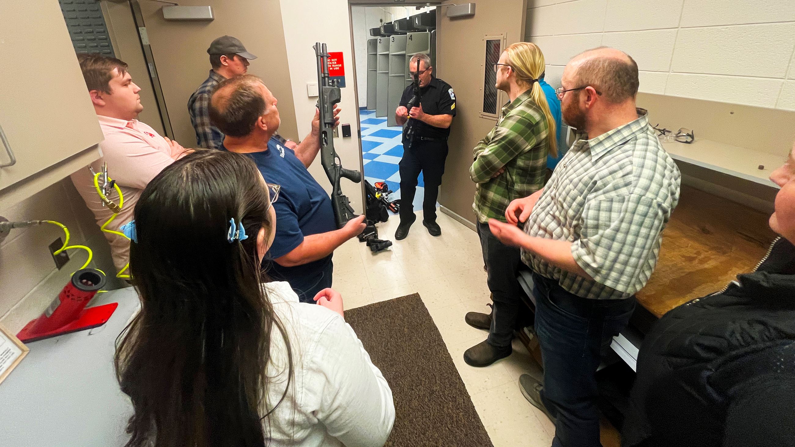 Citizen Academy attendees learn about the array of non-lethal to lethal tools PD may utilize. 