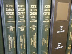 Six books in a row on a shelf